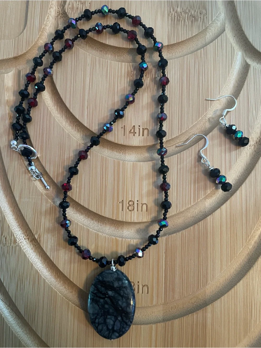 Handcrafted Black and Garnet Beaded Necklace with Oval Stone Pendant